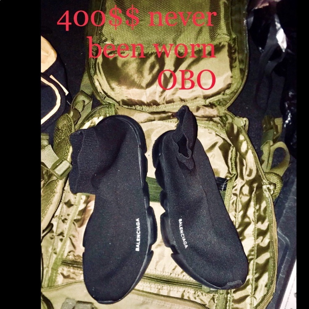 Pair of black on black balenciaga speed trainers